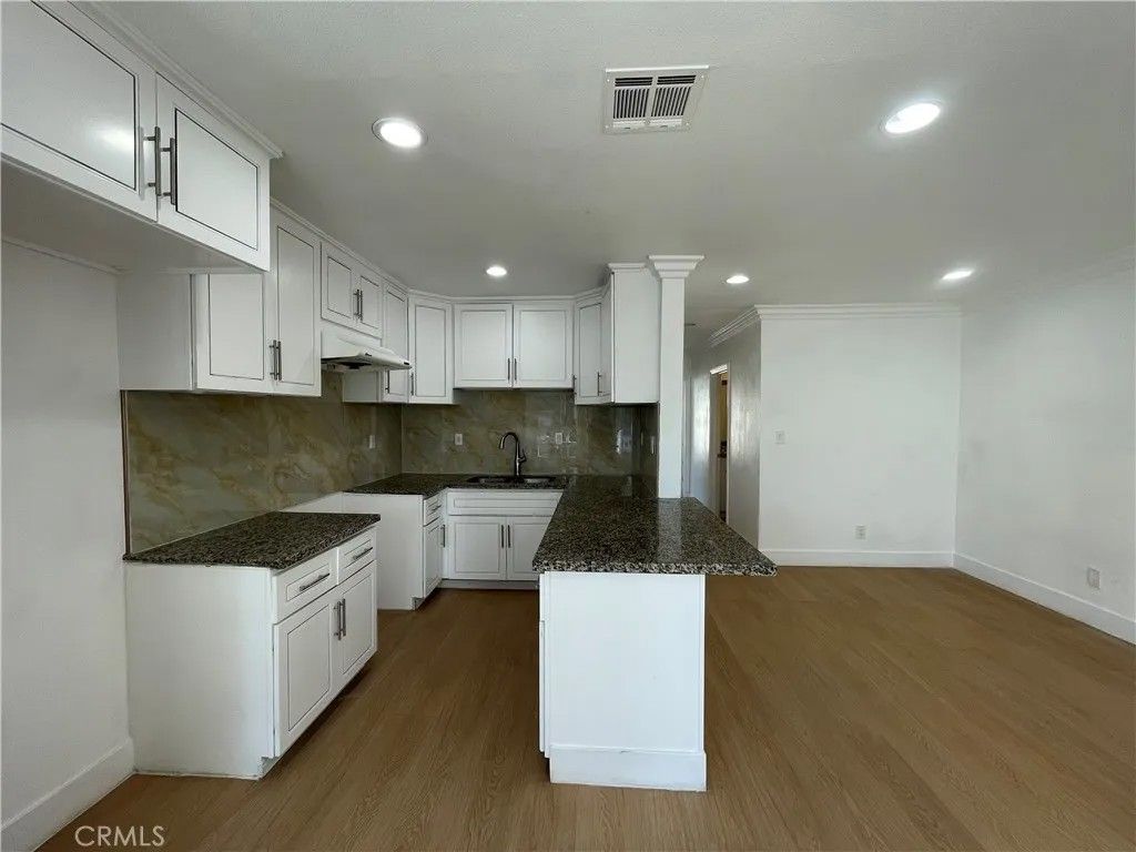 Photo of 1138 N Park Avenue, Pomona, CA 91768 (MLS # WS26017443)