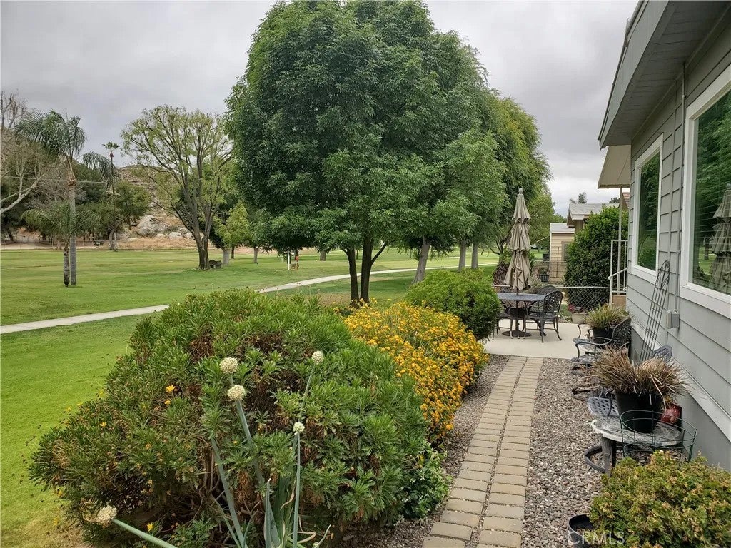Photo of 30761 Paradise Palm Ave, Homeland, CA 92548 (MLS # IG26118867)