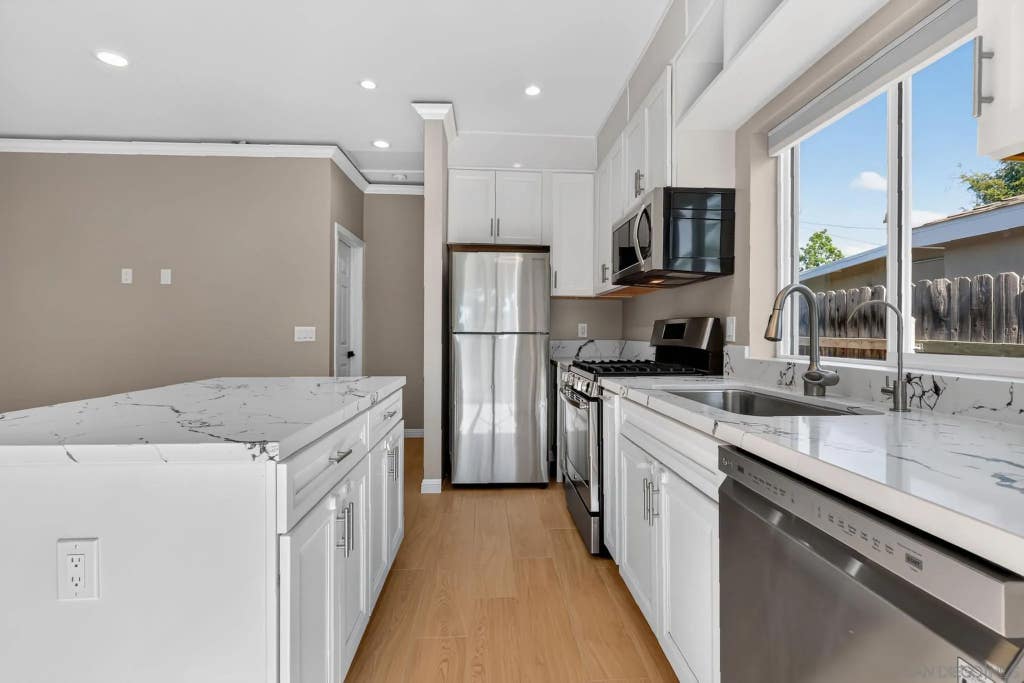 Photo of 7105 Hoffman Ave #A, La Mesa, CA 91941 (MLS # 260018927)