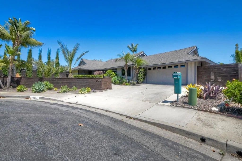 Photo of 1665 Sandalwood Lane, Carlsbad, CA 92008 (MLS # NDP2604183)