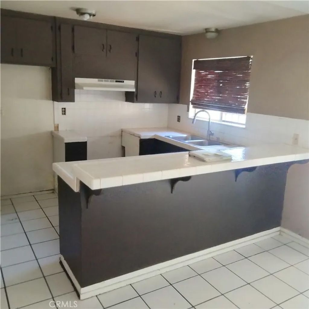 Photo of 2007 Baudin St, Pomona, CA 91766 (MLS # IG26076052)