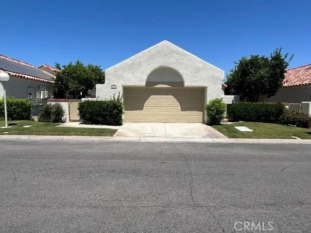 Photo of 77592 Calle Las Brisas, Palm Desert, CA 92211 (MLS # RS26115097)