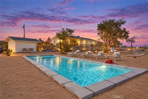 Photo of 130 Delgada Avenue, Yucca Valley, CA 92284 (MLS # JT26224455)