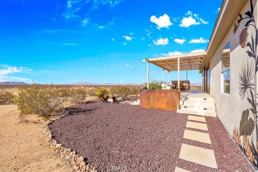 Photo of 60707 Sonora Rd, Joshua Tree, CA 92252 (MLS # JT25278066)