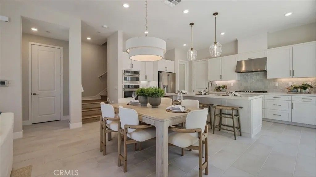 Photo of 27325 Shore Pine Place, Valencia, CA 91381 (MLS # OC25278004)