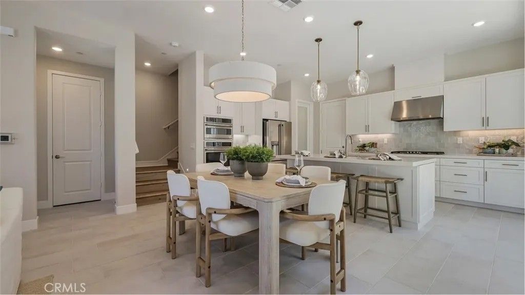 Photo of 27325 Shore Pine Place, Valencia, CA 91381 (MLS # OC25278004)