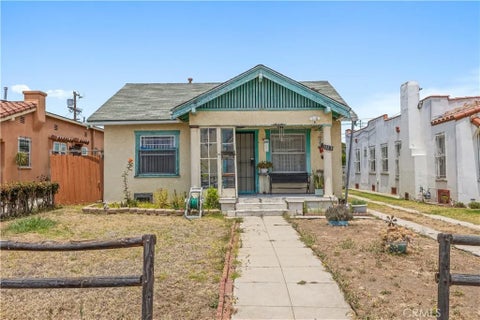 Photo of 1119 W 84th Place, Los Angeles, CA 90044 (MLS # DW26143109)