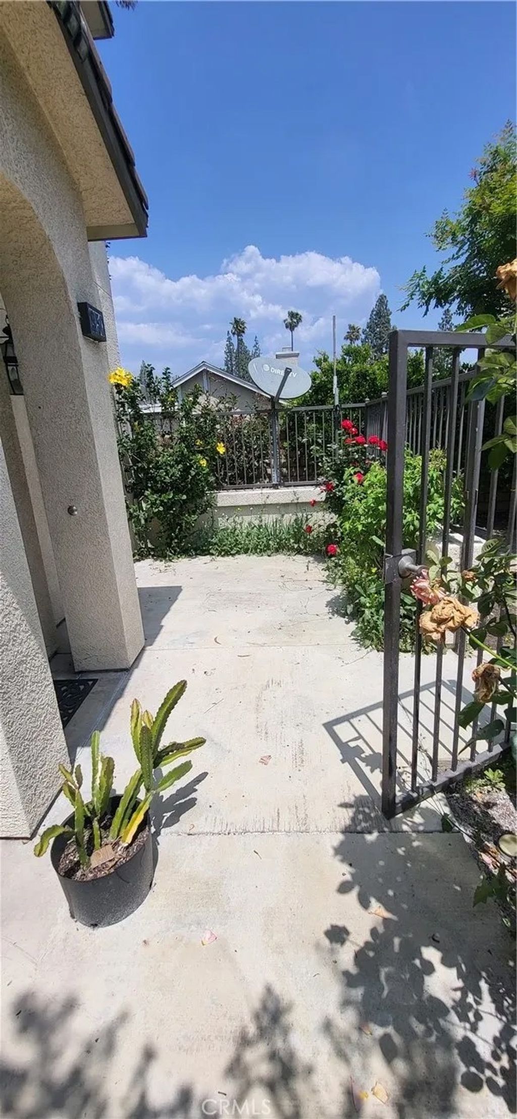 Photo of 1925 E Harvard Privado #C, Ontario, CA 91764 (MLS # TR26101360)