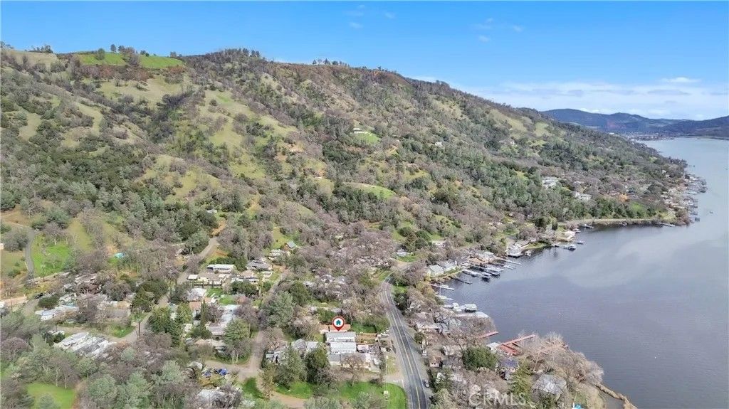 Photo of 9950 E Highway 20, Clearlake Oaks, CA 95423 (MLS # LC26032200)