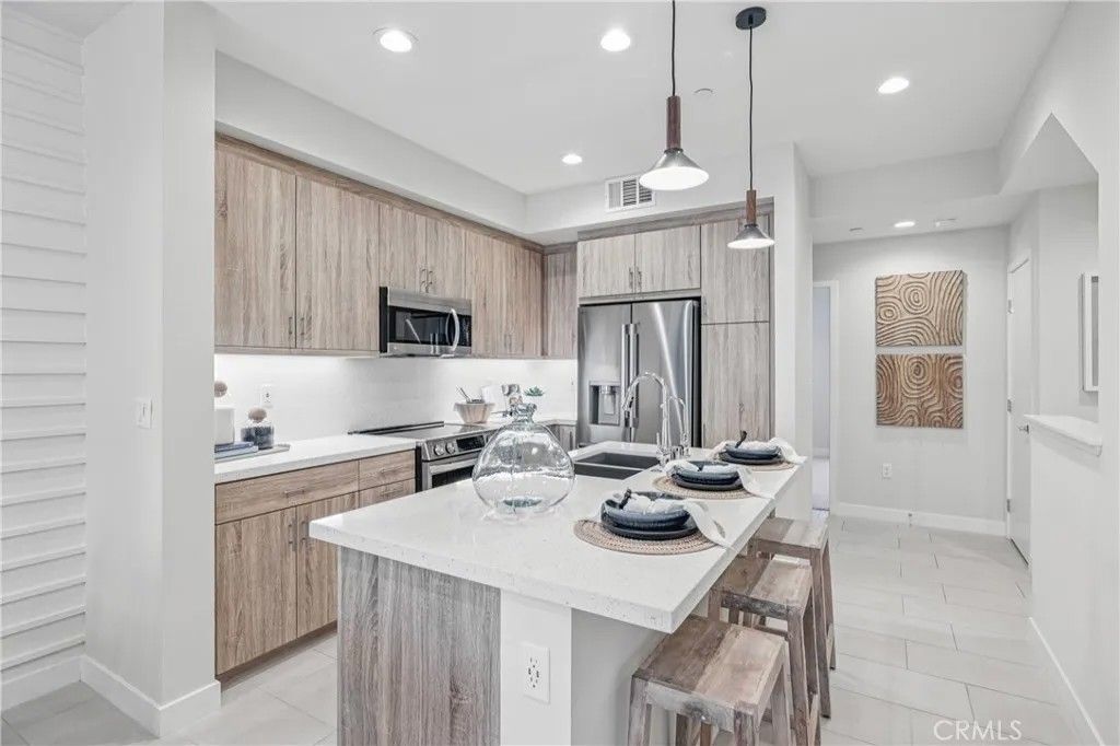 Photo of 11716 Arkansas Street #H, Artesia, CA 90701 (MLS # OC25272412)