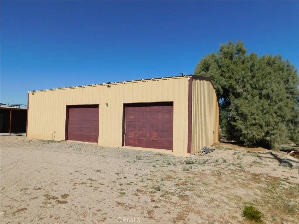 Photo of 7491 Sherman Hoyt Ave, 29 Palms, CA 92277 (MLS # JT26029923)