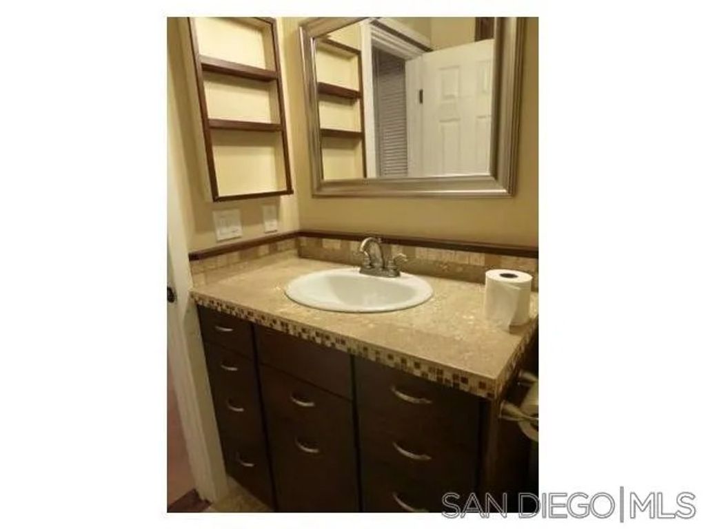 Photo of 6396 Estrella Avenue, San Diego, CA 92120 (MLS # 260010715)