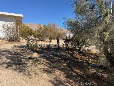 Photo of 51136 Mecca Road, Morongo Valley, CA 92256 (MLS # JT25273243)