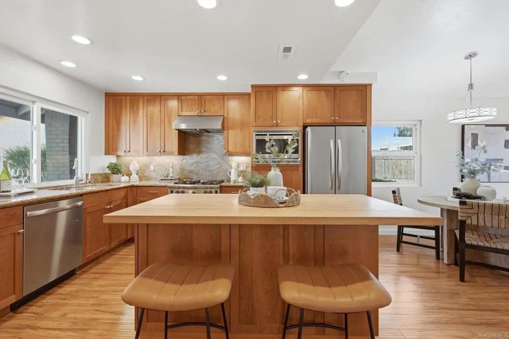 Photo of 7945 Calle Madrid, Carlsbad, CA 92009 (MLS # NDP2602684)