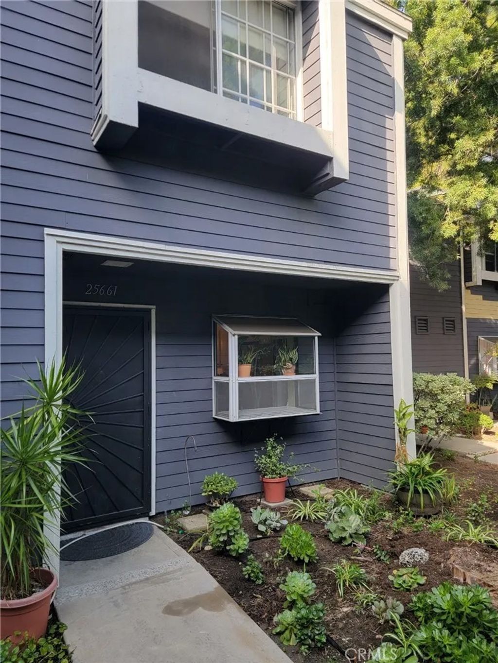 Photo of 25661 Pine Creek, Wilmington, CA 90744 (MLS # SW25279968)