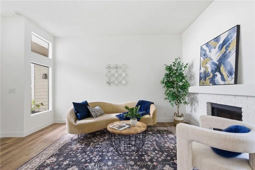 Photo of 4900 N Grand Ave #103, Covina, CA 91724 (MLS # PF26063424)