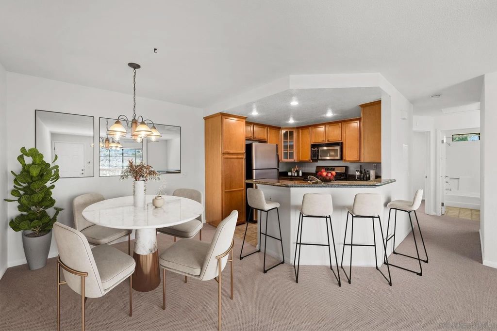 Photo of 12560 Carmel Creek Rd #54, San Diego, CA 92130 (MLS # 260005909)