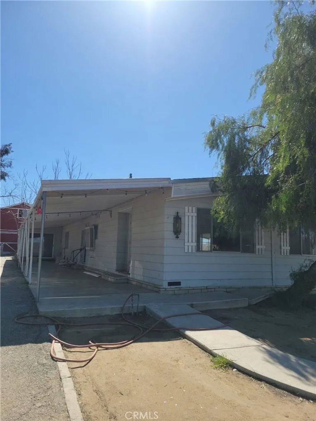 Photo of 30321 13th St, Nuevo, CA 92567 (MLS # IV26072405)