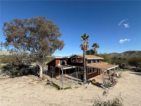 Photo of 10219 North Star Trail, Morongo Valley, CA 92256 (MLS # JT26008249)