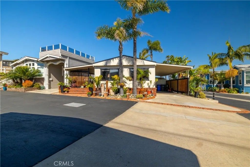 Photo of 204 Easy Pl, Carlsbad, CA 92011 (MLS # CV25267193)