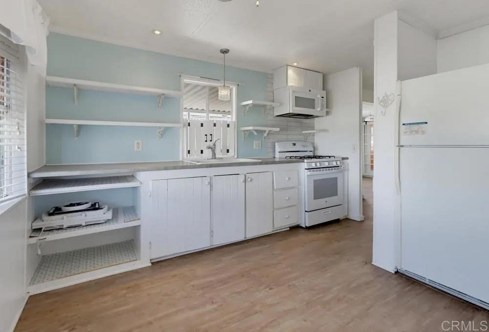 Photo of 2130 Sunset Dr #104, Vista, CA 92081 (MLS # NDP2607334)