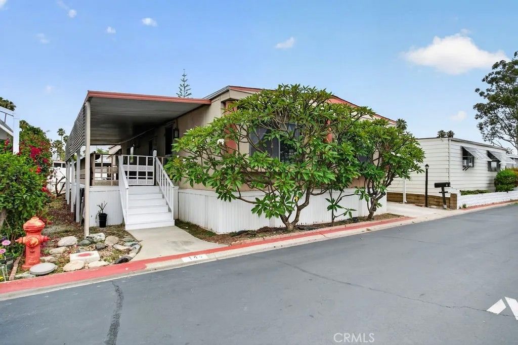 Photo of 24922 Muirlands BLVD #144, Lake Forest, CA 92630 (MLS # OC26104059)