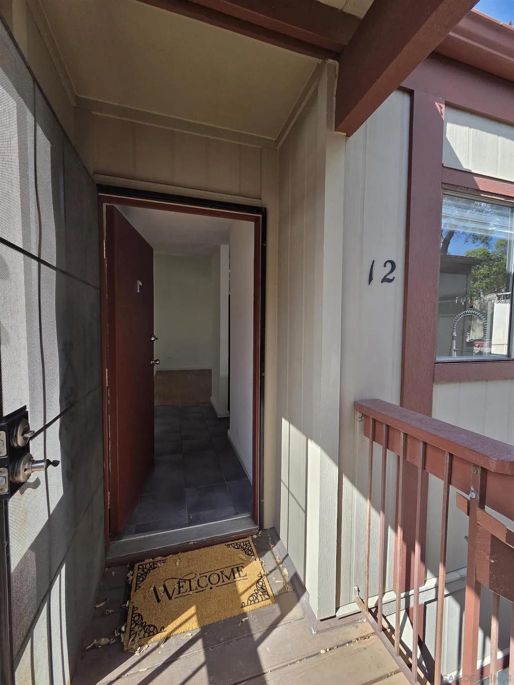 Photo of 5432 Adobe Falls Rd #12, San Diego, CA 92120 (MLS # 260013791)
