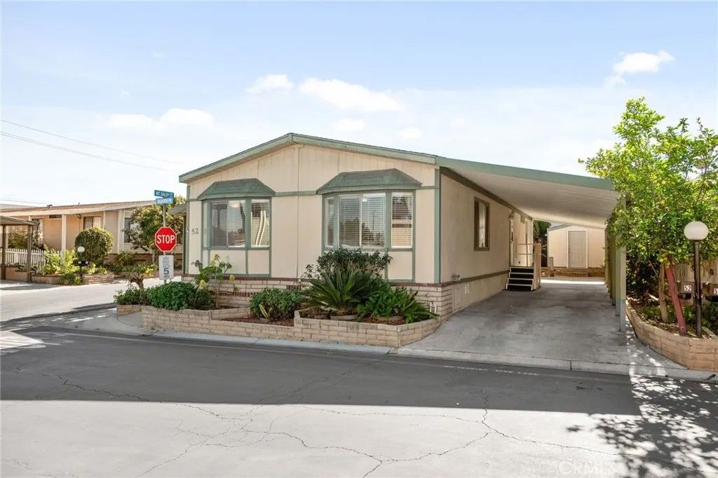 Photo of 1550 Rimpau Ave #52, Corona, CA 92881 (MLS # CV26015128)