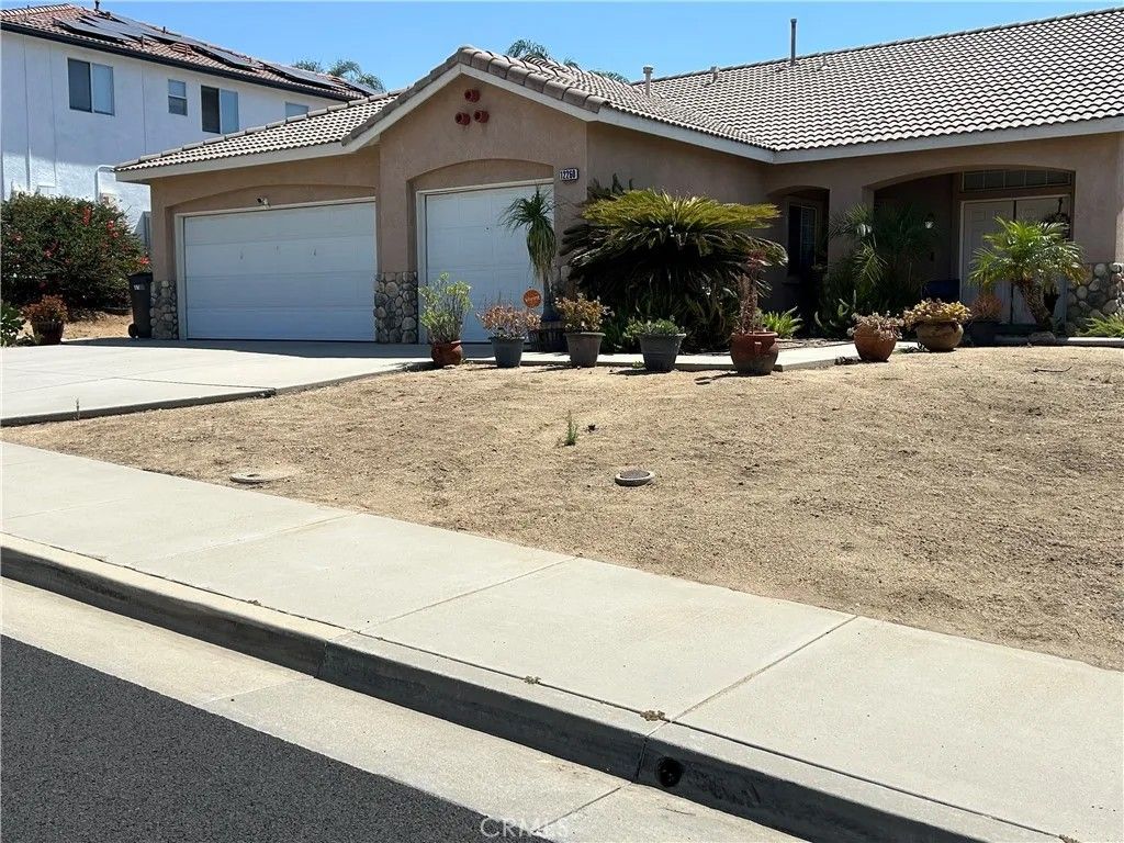 Photo of 12260 Via De Palmas DR, Moreno Valley, CA 92555 (MLS # IV26112693)