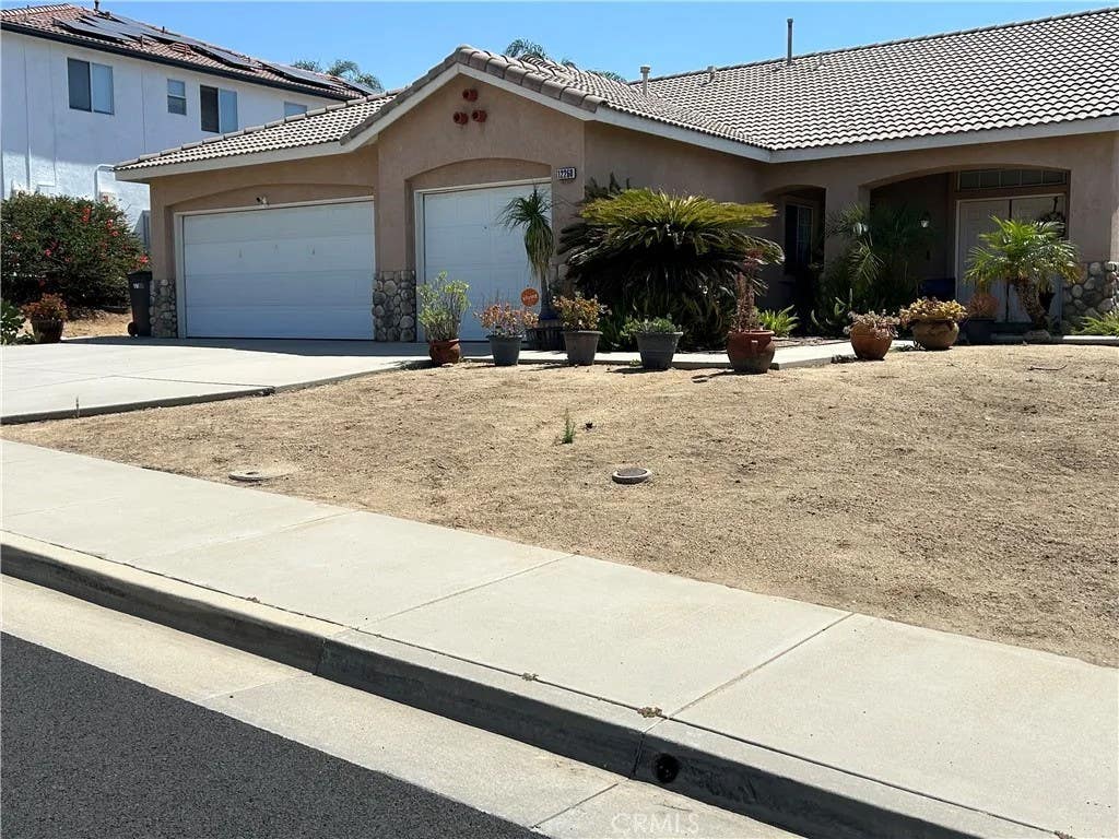 Photo of 12260 Via De Palmas DR, Moreno Valley, CA 92555 (MLS # IV26112693)