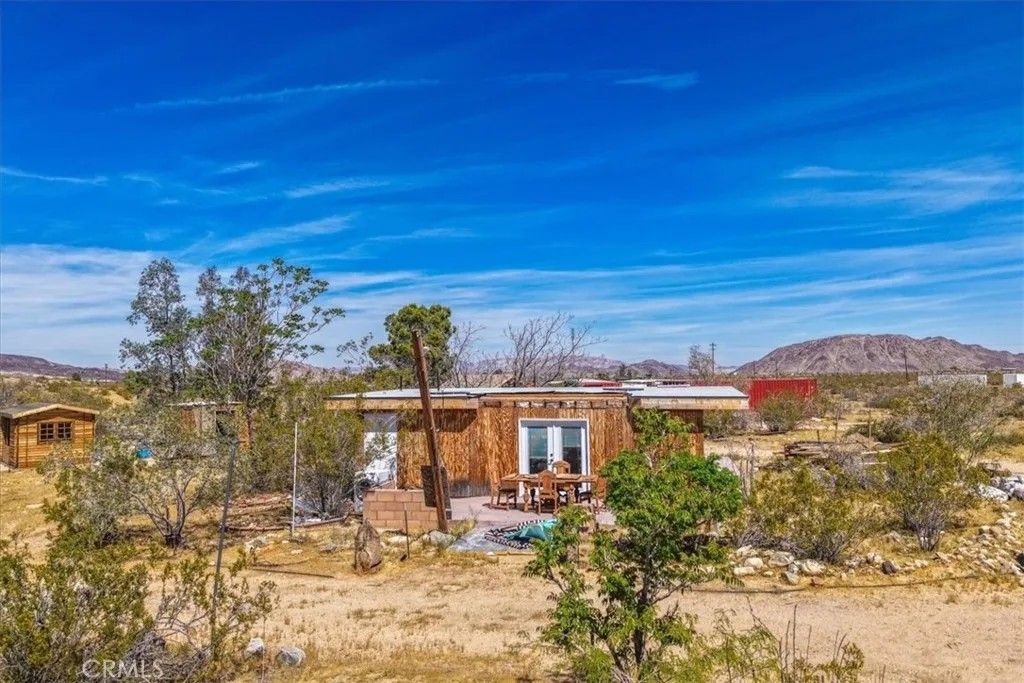 Photo of 1022 Chuckawalla Road, Landers, CA 92285 (MLS # JT26066683)