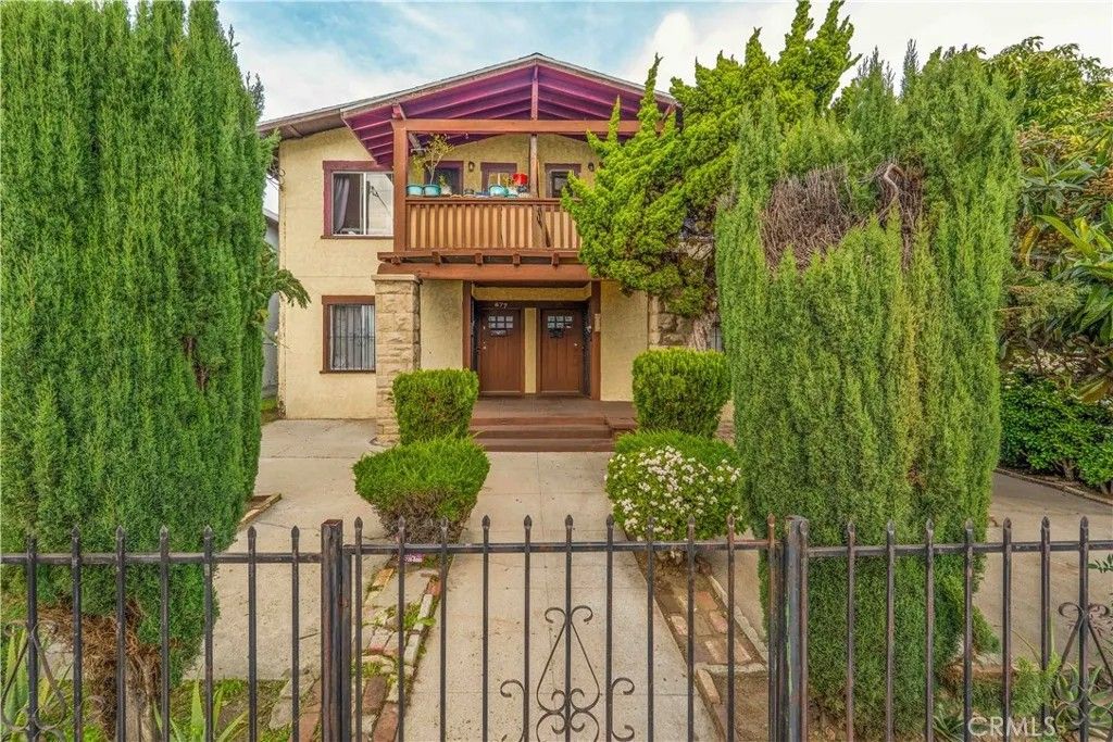 Photo of 873 W Vernon Ave, Los Angeles, CA 90037 (MLS # DW26013385)