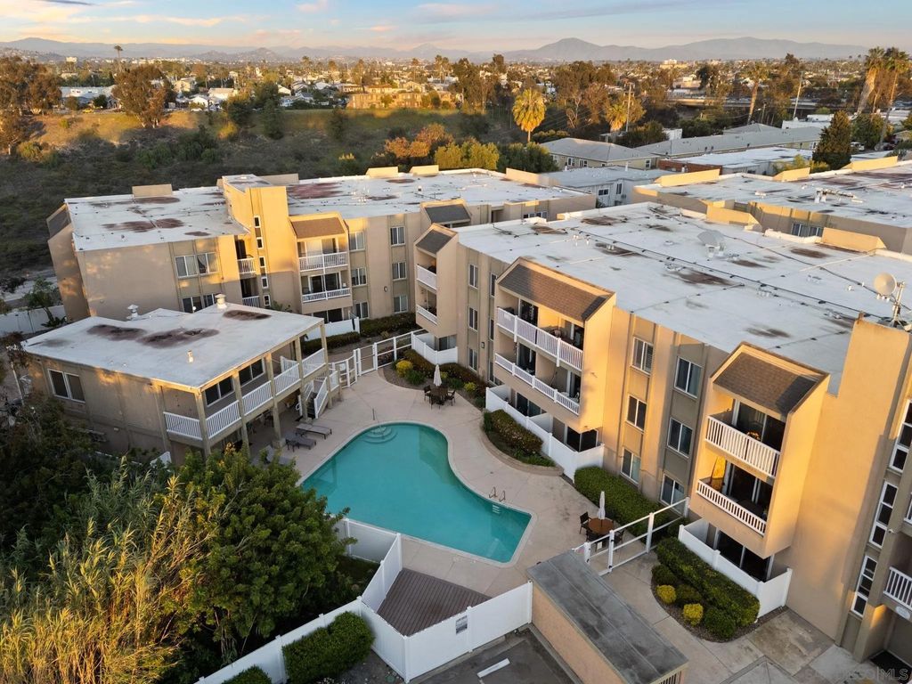 Photo of 3030 Suncrest Dr #104, San Diego, CA 92116 (MLS # 2600501)