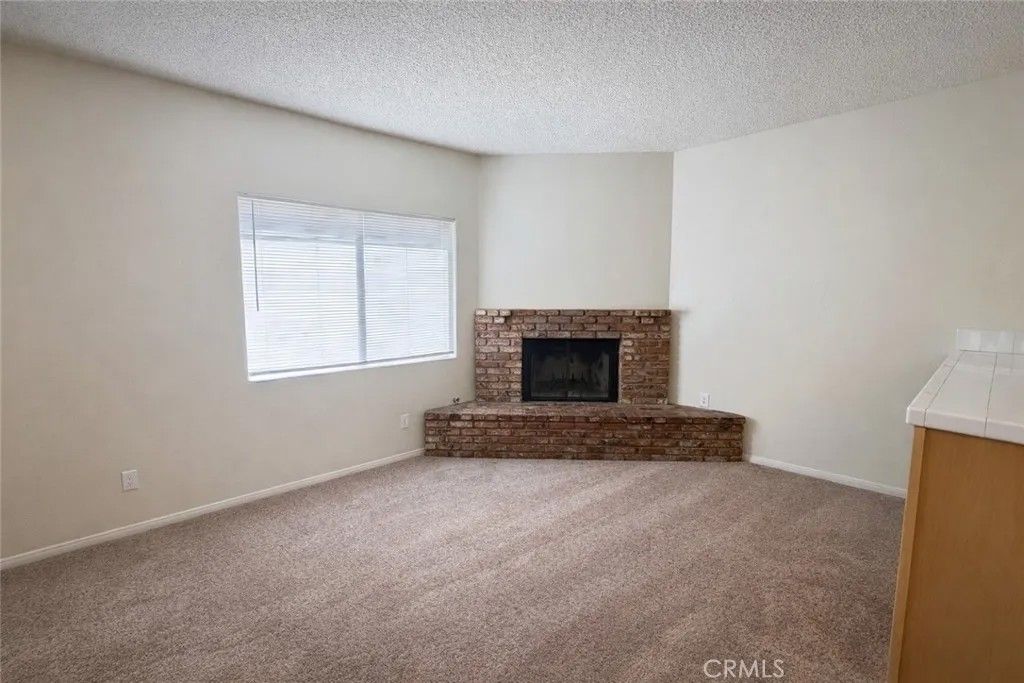 Photo of 38710 10th St E St #15, Palmdale, CA 93550 (MLS # SR26036993)