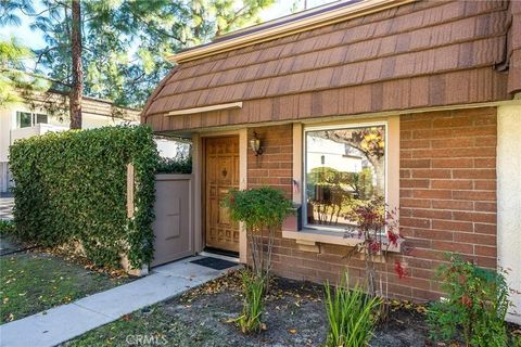 Photo of 10214 Larwin Ave #7, Chatsworth, CA 91311 (MLS # SR26012047)