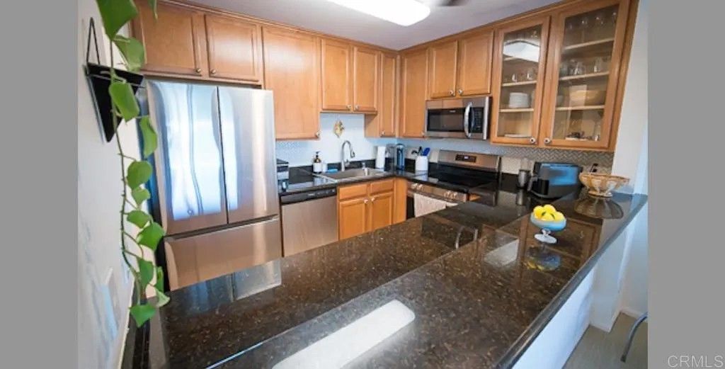 Photo of 3030 Suncrest Drive #304, San Diego, CA 92116 (MLS # PTP2602232)