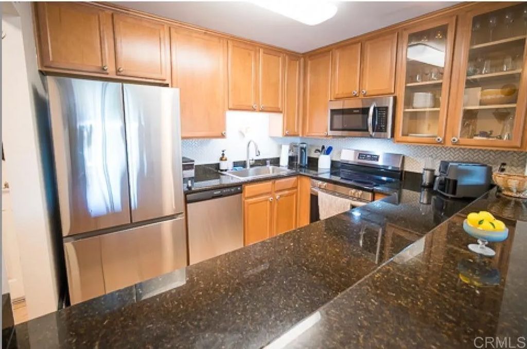 Photo of 3030 Suncrest Drive #304, San Diego, CA 92116 (MLS # PTP2602232)