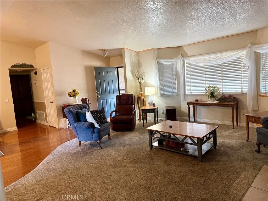 Photo of 14372 Woodland Drive, Victorville, CA 92395 (MLS # HD25276068)