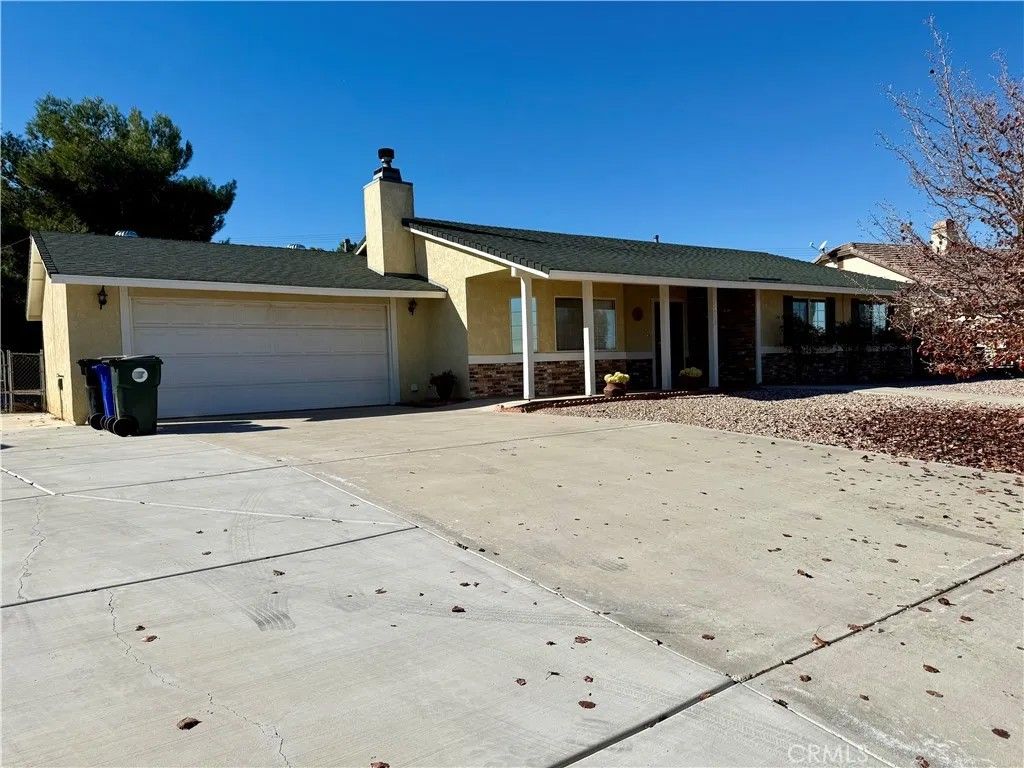 Photo of 14372 Woodland Drive, Victorville, CA 92395 (MLS # HD25276068)
