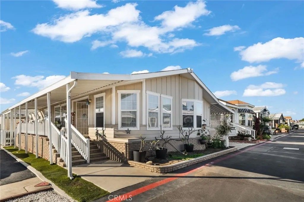 Photo of 9850 Garfield Ave #110, Huntington Beach, CA 92646 (MLS # OC26016068)
