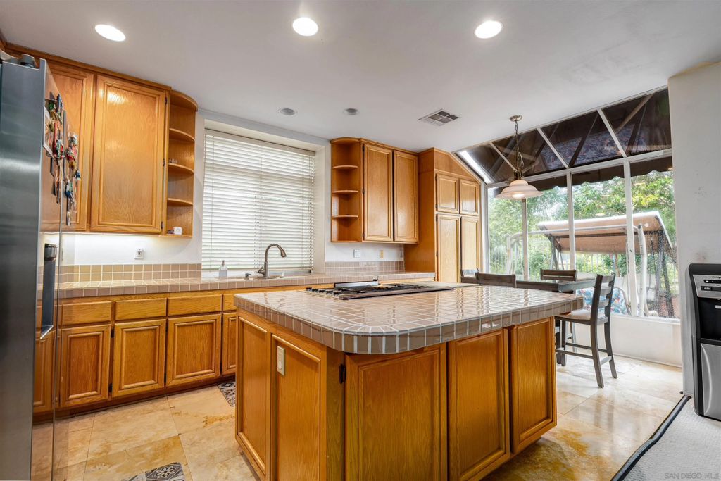 Photo of 13957 Carmel Ridge Rd, San Diego, CA 92128 (MLS # 260003875)