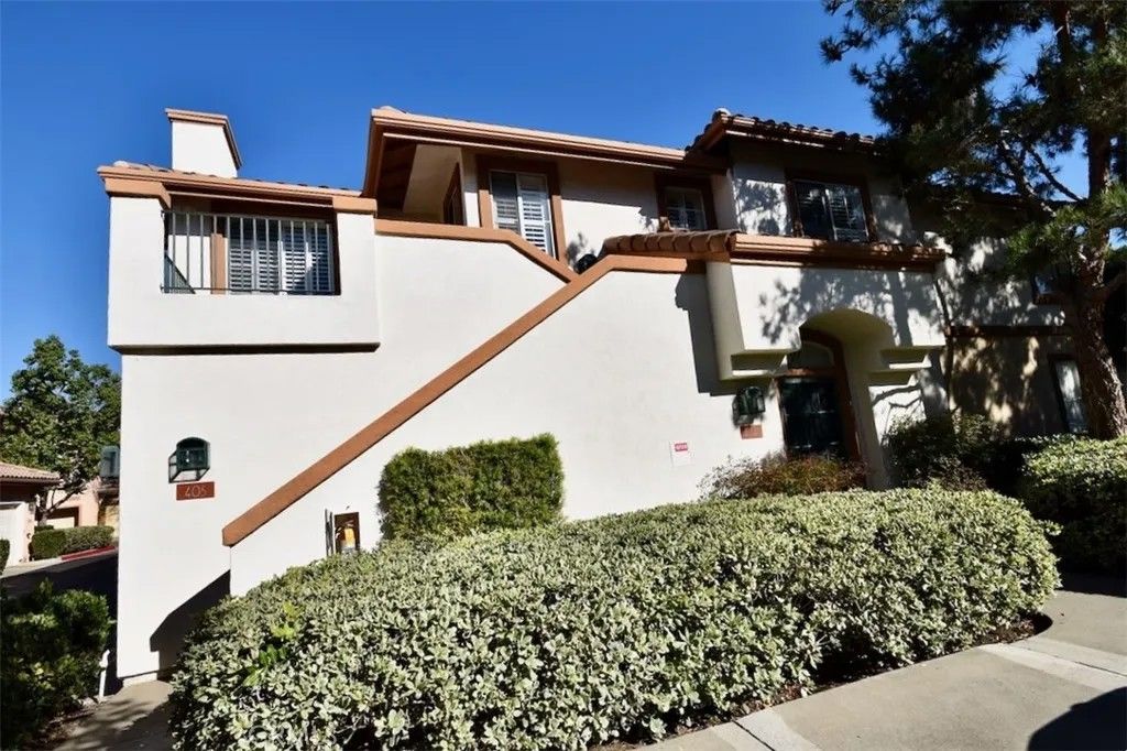 Photo of 405 Tropea Aisle, Irvine, CA 92606 (MLS # OC25272988)