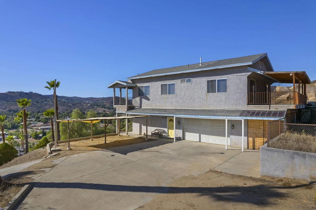 Photo of 11535 Rocky Ln, Lakeside, CA 92040 (MLS # 250042108)