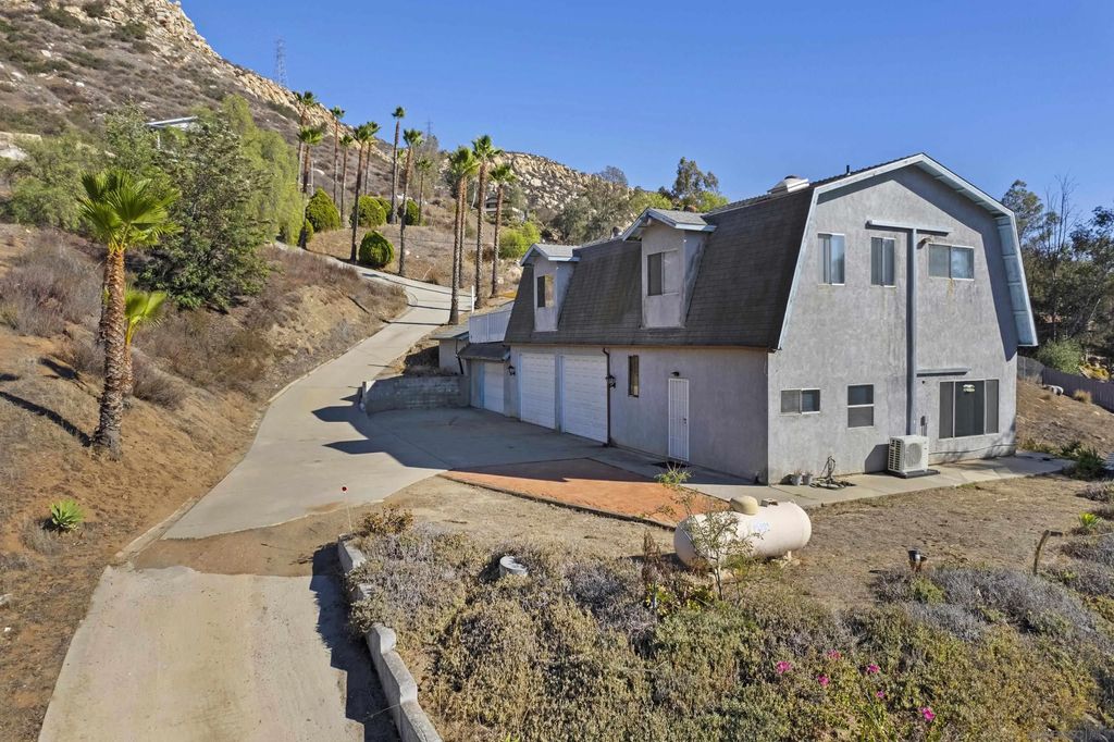 Photo of 11535 Rocky Ln, Lakeside, CA 92040 (MLS # 250042108)