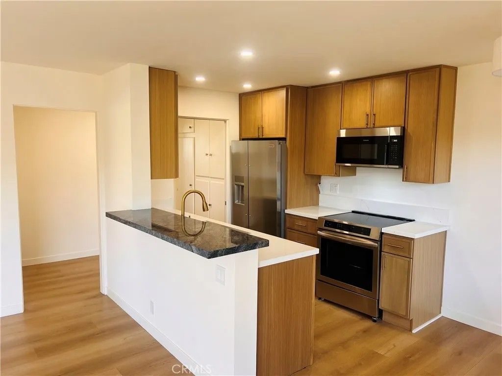 Photo of 2500 E 2nd St #405, Long Beach, CA 90803 (MLS # PW26083618)