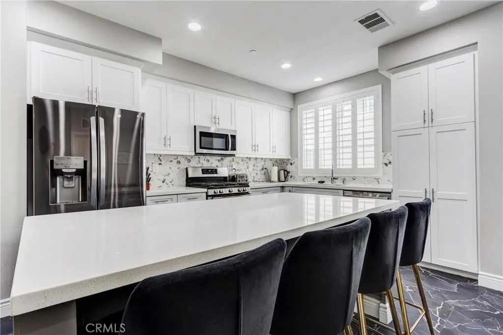 Photo of 625 Savi Drive #102, Corona, CA 92878 (MLS # SW26014329)