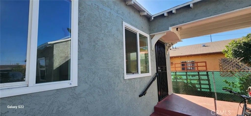 Photo of 1726 W 55th St, Los Angeles, CA 90062 (MLS # DW26091094)