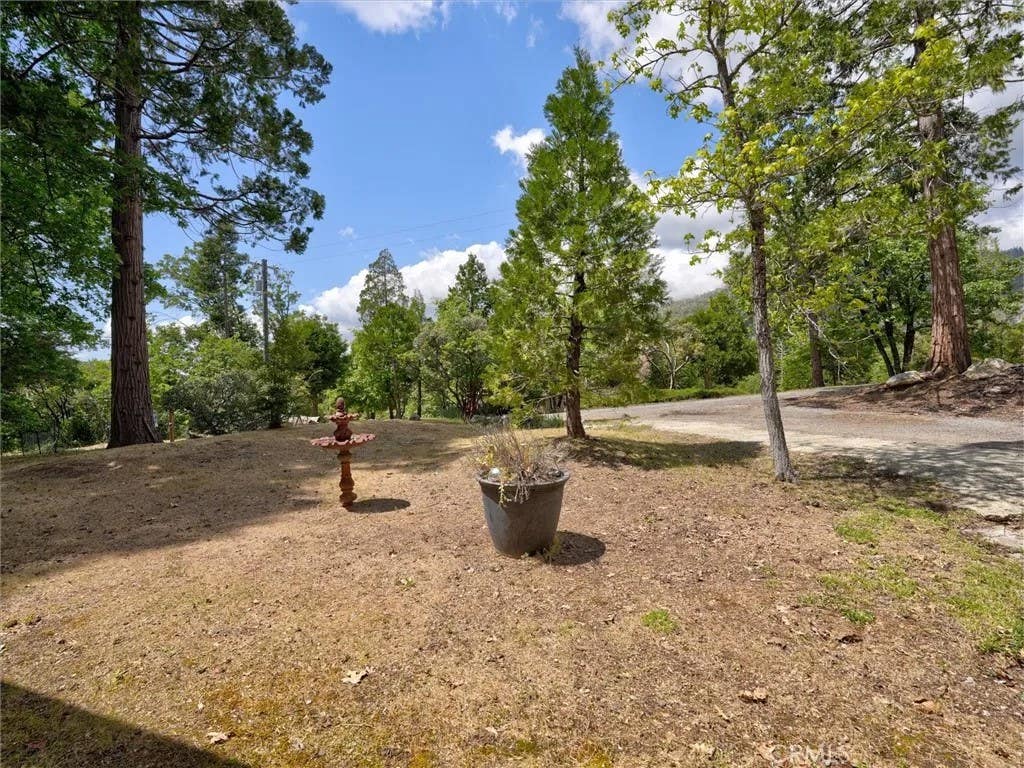 Photo of 60036 Cascadel Dr S Dr, North Fork, CA 93643 (MLS # FR26169706)