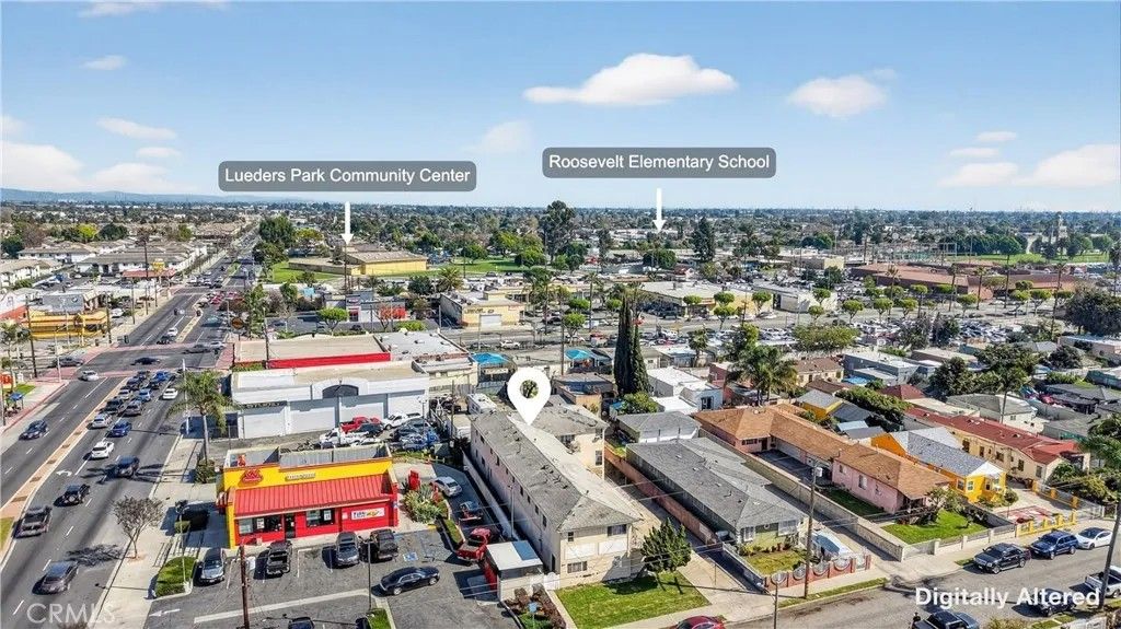 Photo of 1004 N Poinsettia Ave, Compton, CA 90221 (MLS # CV26053100)