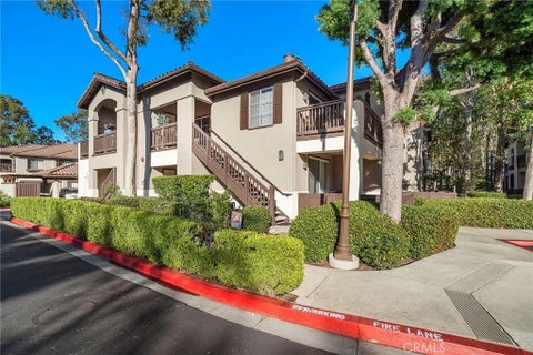 Photo of 2960 Champion Way #709, Tustin, CA 92782 (MLS # OC26165279)